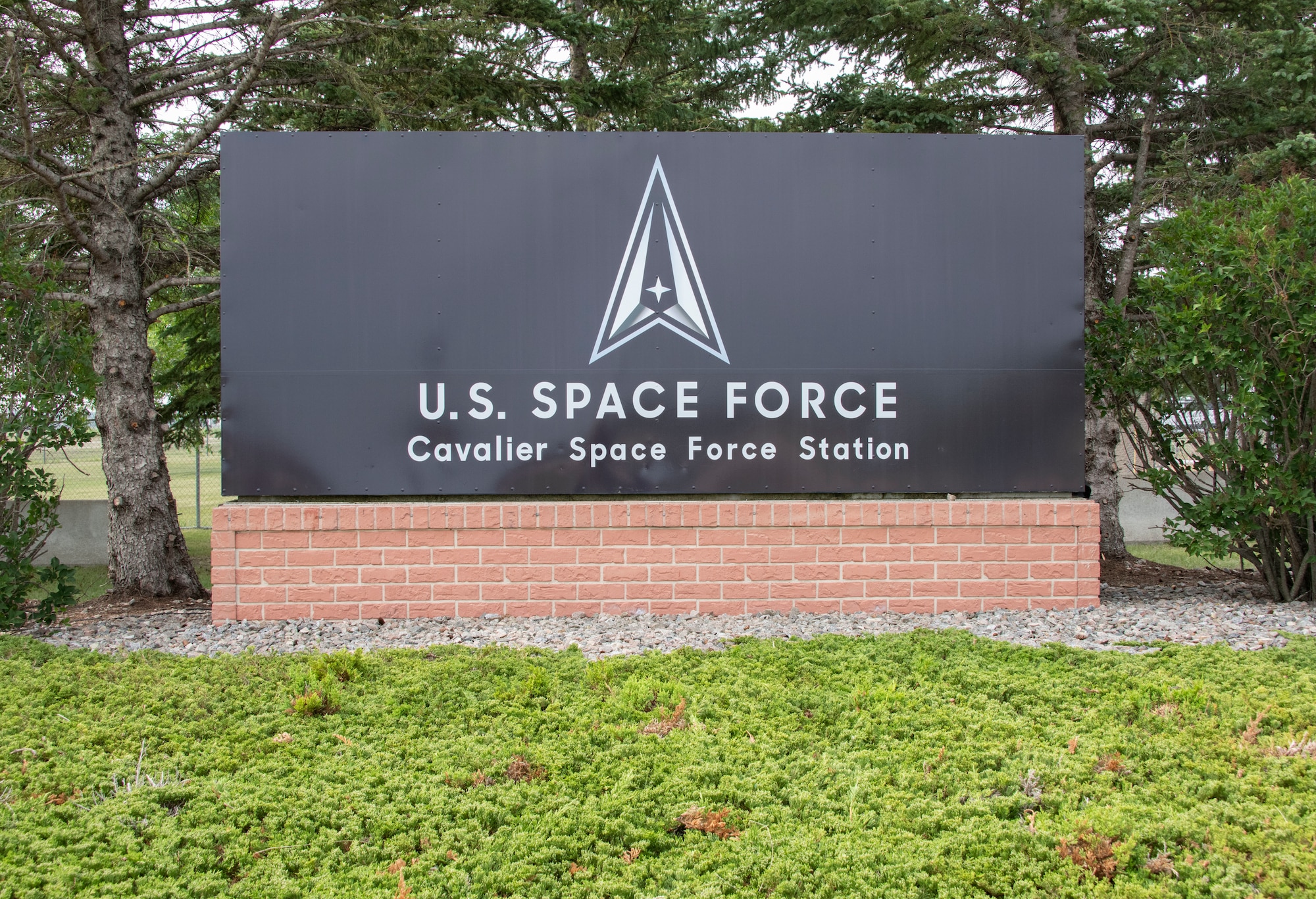 The Cavalier Space Force Station sign is unveiled during the renaming ceremony at Cavalier Space Force Station, N.D., July 30, 2021.
