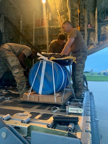 A team of U.S. Air Force Airmen load an airdrop bundle of medical supplies onto a U.S. Air Force C-130J Super Hercules, call sign “KANTO 92,” assigned to 36th Airlift Squadron deployed from Yokota Air Force Base, Japan, at Andersen Air Force Base, Guam, July 25, 2021. Members from U.S. Air Force, U.S. Navy, U.S. Coast Guard worked together to provide lifesaving assistance to a U.S. Army Soldier after the individual sustained an injury while at sea on an Army Watercraft System during Exercise Forager 21.