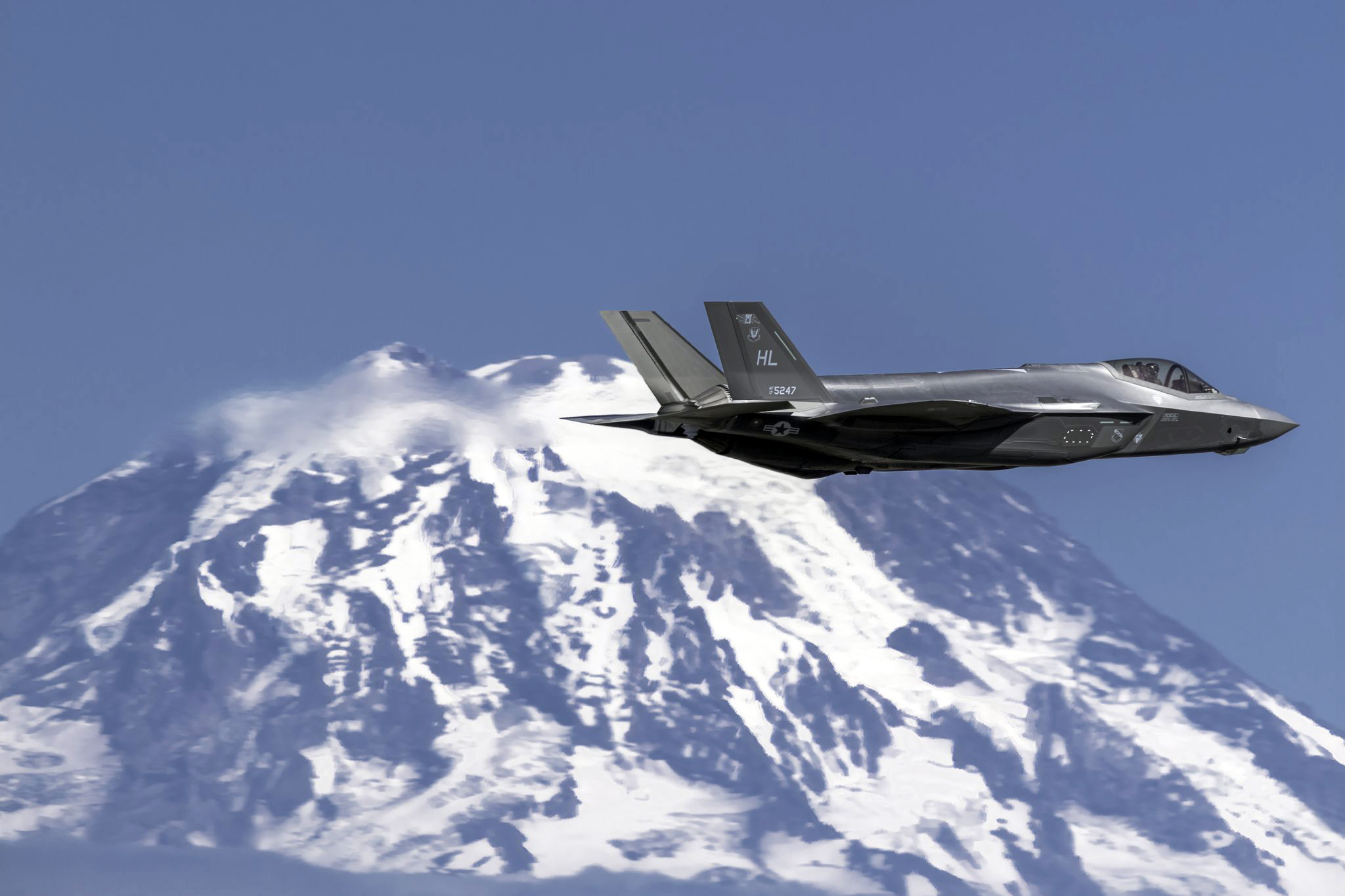 F-35A Lighting II Flying with Tacoma Mountains on Flank