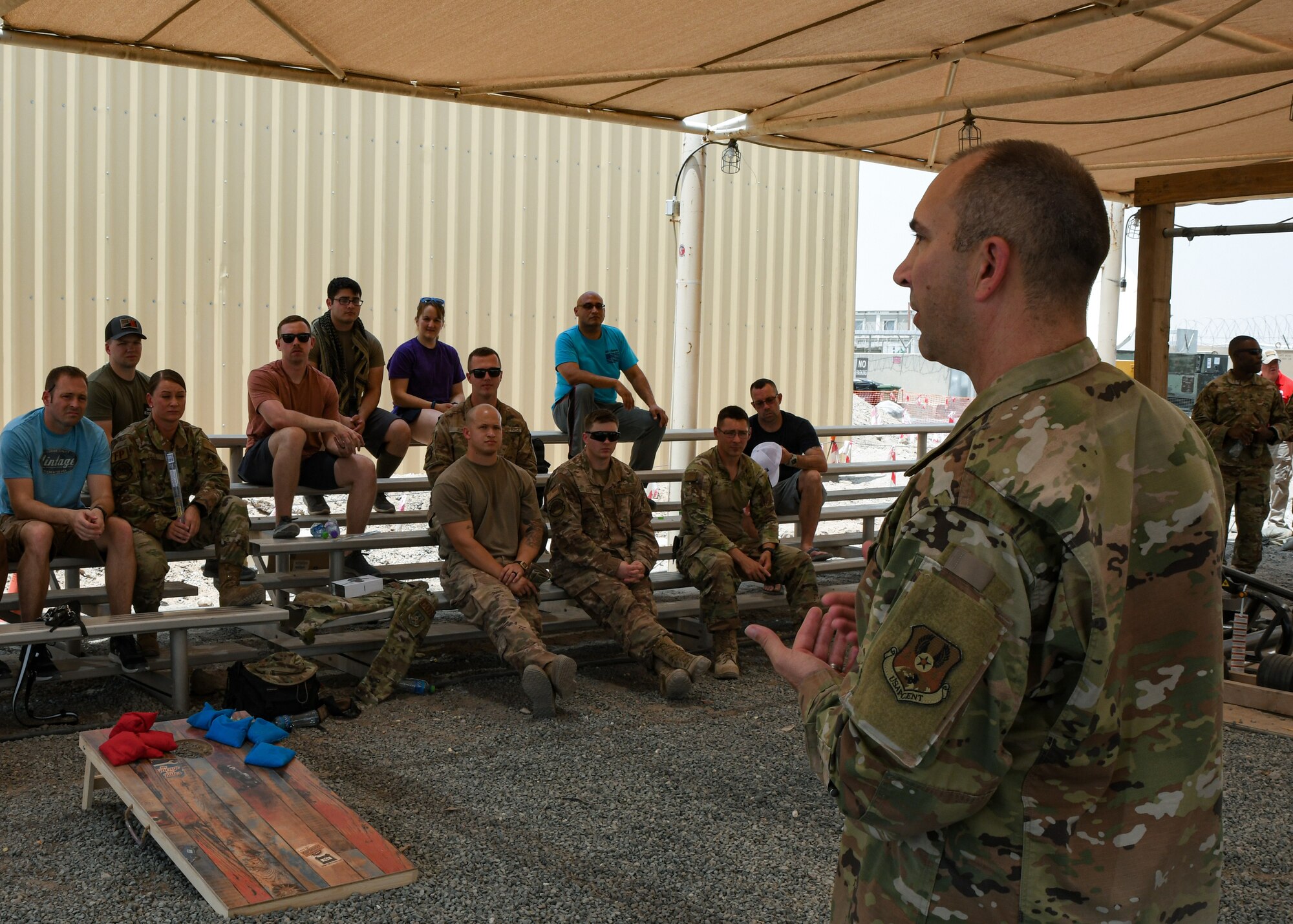 A photo of an Airman giving a speech