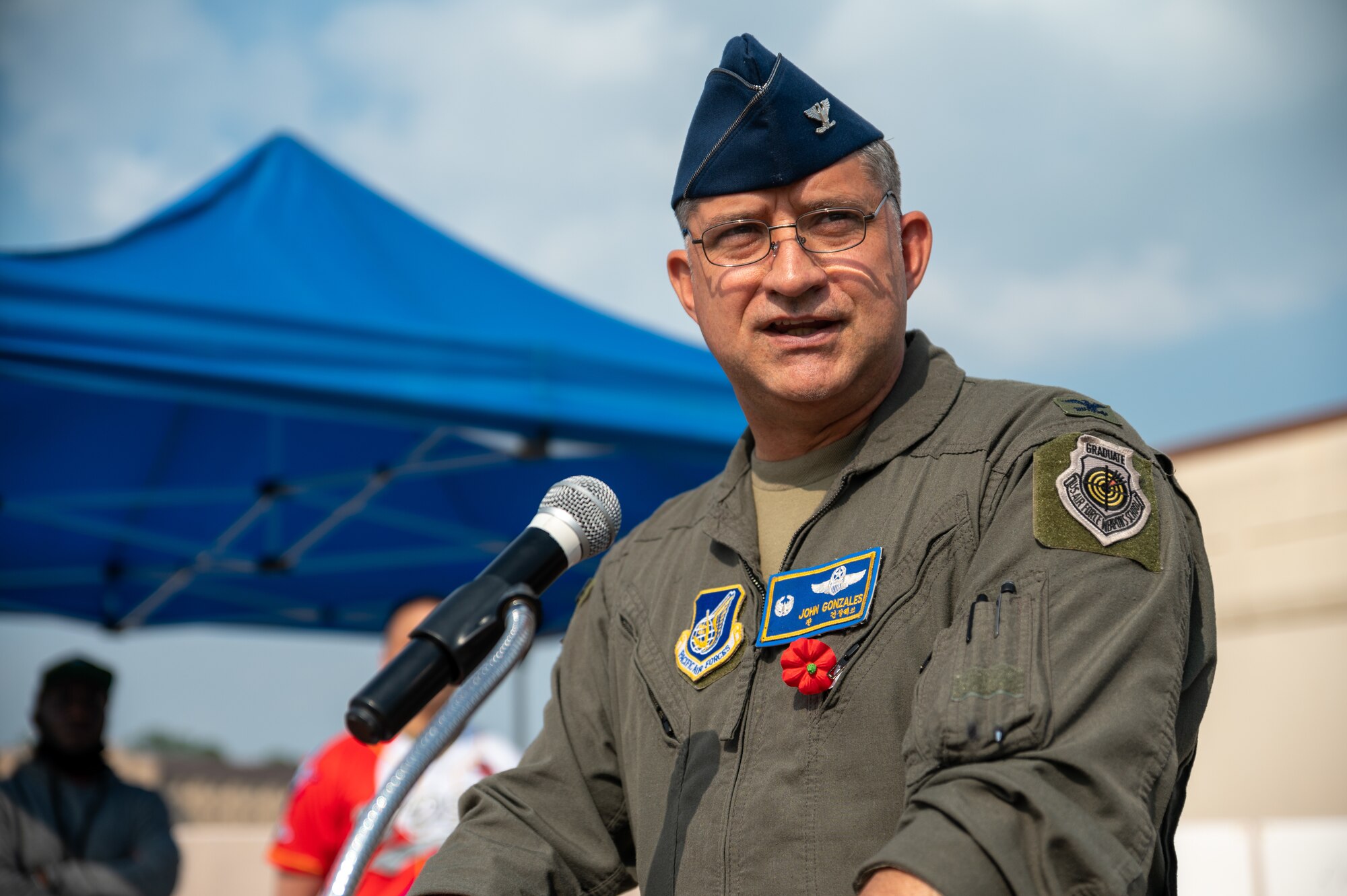 U.S. Air Force Col. John Gonzales, 51st Fighter Wing commander, speaks during a Memorial Day remembrance event at Osan Air Base, Republic of Korea, May 28, 2021. Memorial Day started as an event to honor Union soldiers who died during the American Civil War. (U.S. Air Force photo by Senior Airman Branden Rae)