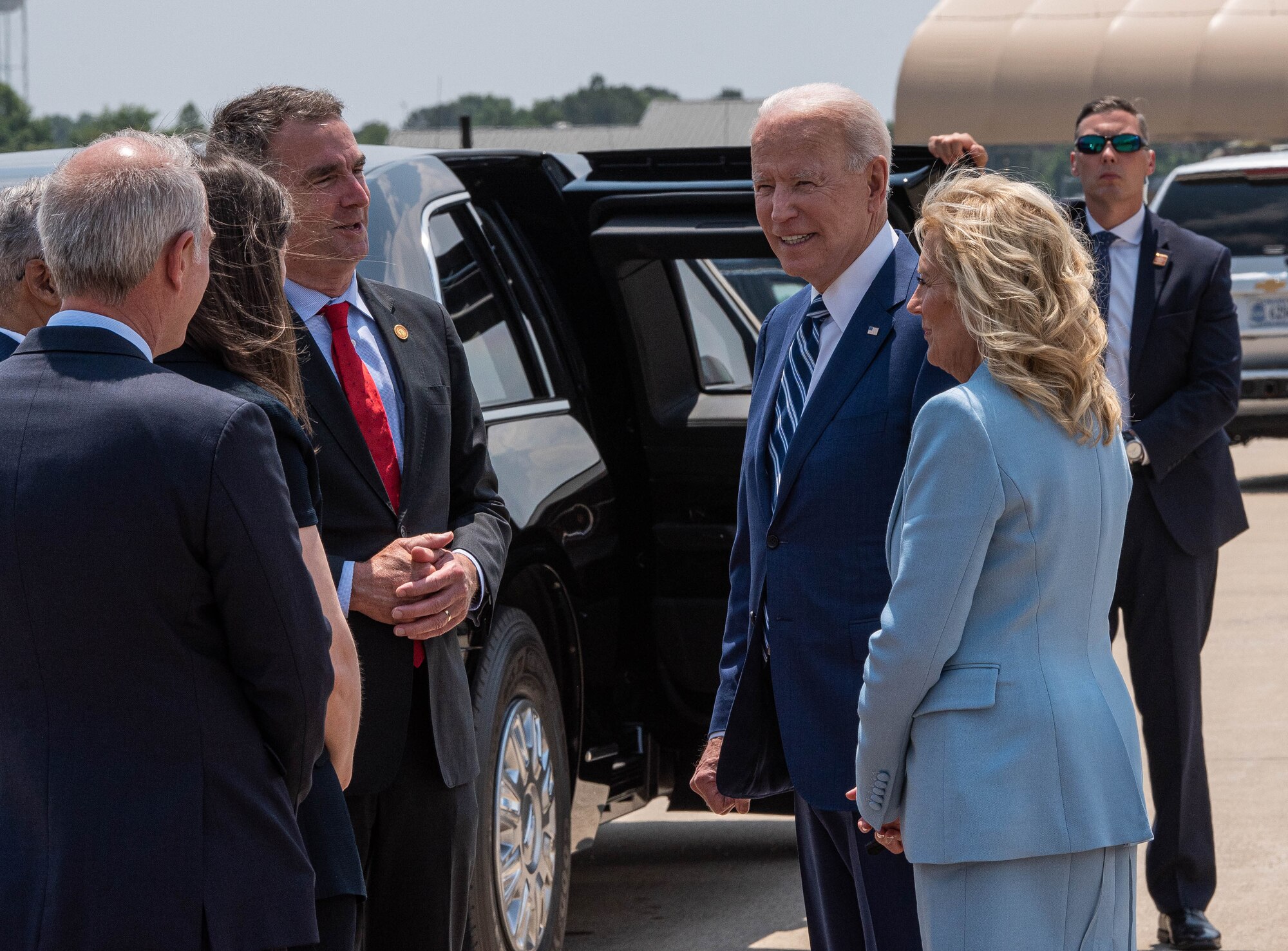 President Joe Biden and first lady Jill Biden interact with elected officials.