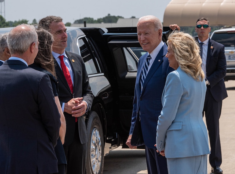 President Joe Biden and first lady Jill Biden interact with elected officials.