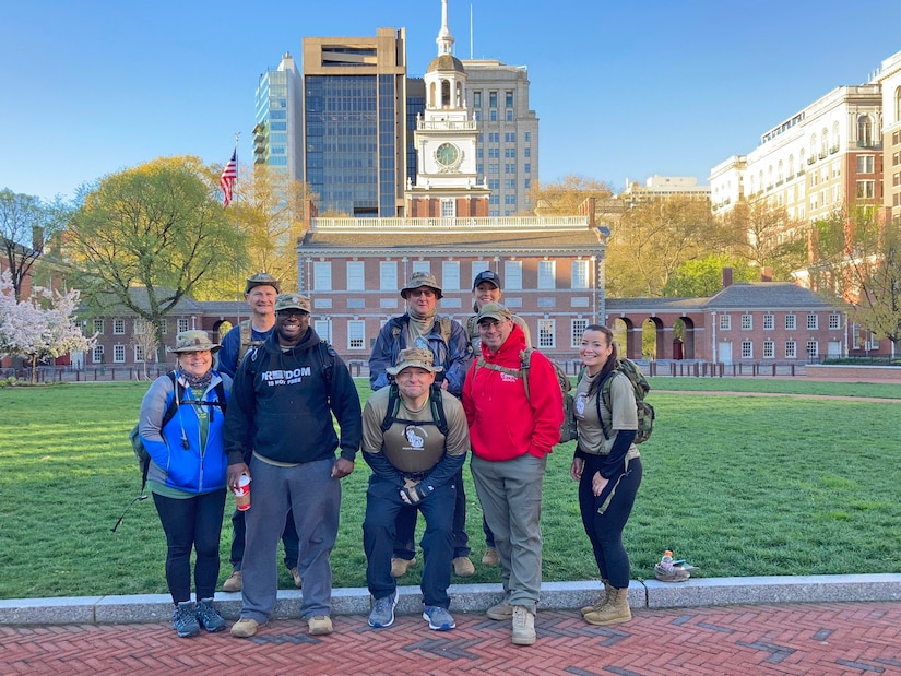 A team comprised of current and former members of the 111th Attack Wing headquartered at Biddle Air National Guard Base in Horsham, Pennsylvania, pose for a photo at Philadelphia's Independence National Historic Park during the 32nd annual Bataan Memorial Death March April 17, 2021.