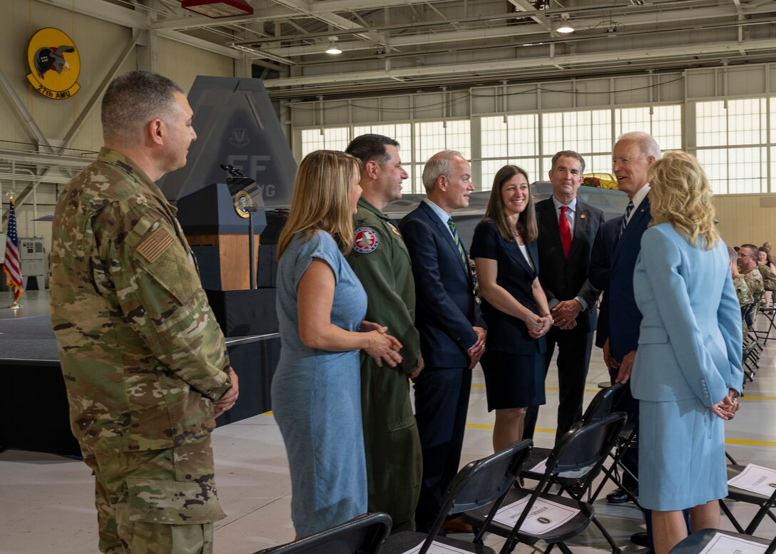 President Joe Biden and first lady Jill Biden interact with elected officials.