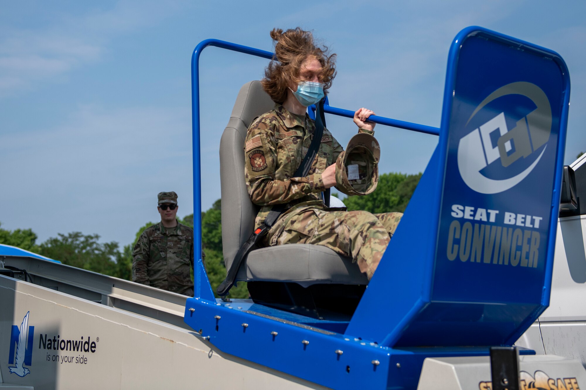 Airman 1st Class Zada Anderson, 334th Fighter Squadron aviation resource management specialist rides on a seat belt convincer during safe driving training at Seymour Johnson Air Force Base, North Carolina, May 26, 2021.