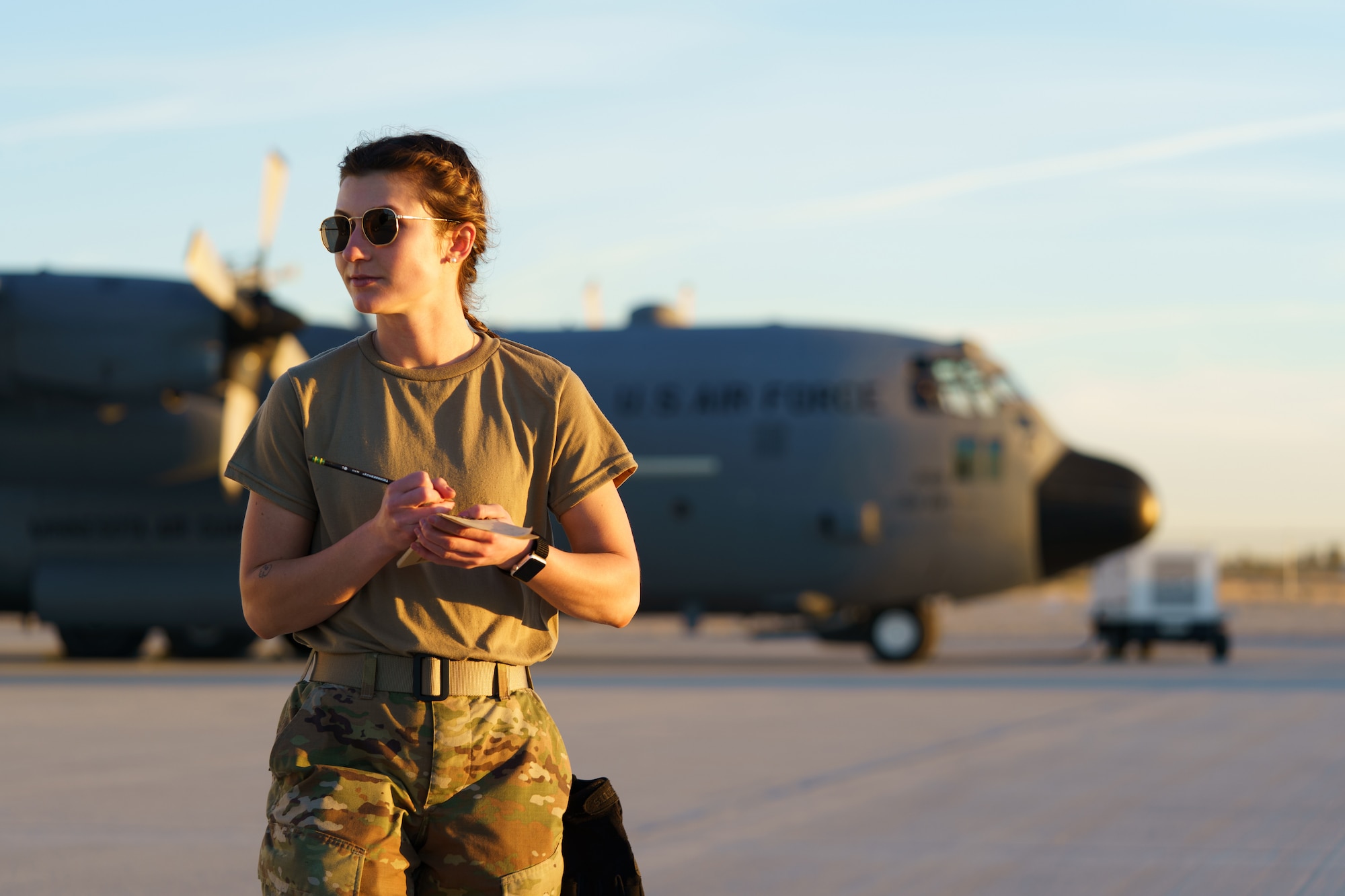 U.S. Air Force Staff Sgt. Megan Lenling, 133rd Air Transportation Function, observes flight line operations for the Air Terminal Operations Center in Yuma, Ariz., Feb. 22, 2021.