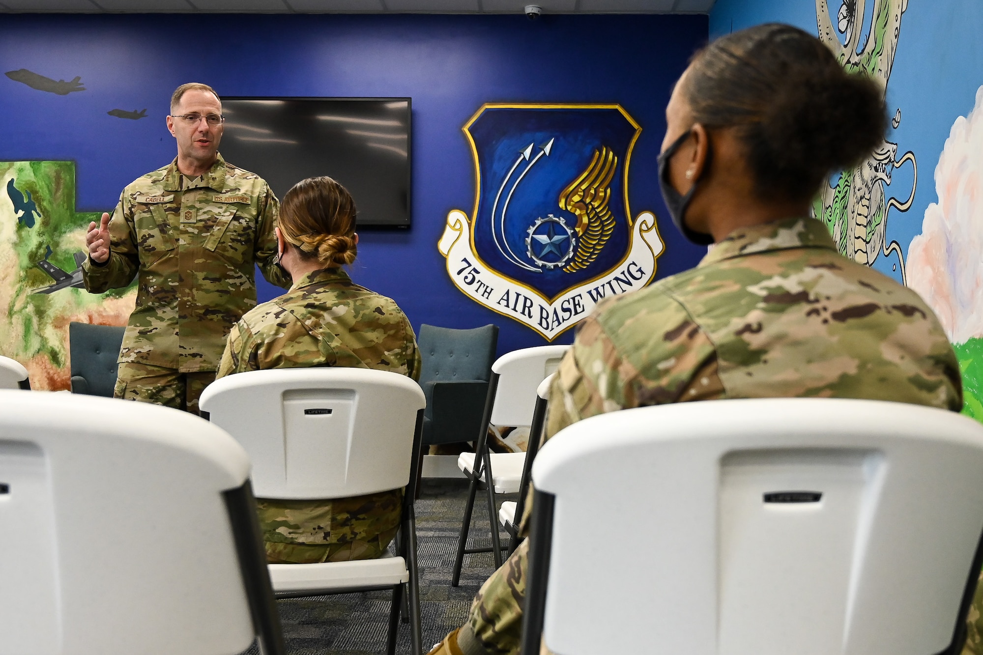 Chief Master Sgt. Stanley C. Cadell, command chief of Air Force Materiel Command, speaks with junior enlisted Airmen during a visit to Hill Air Force Base, Utah, May 25, 2021. (U.S. Air Force photo by R. Nial Bradshaw)