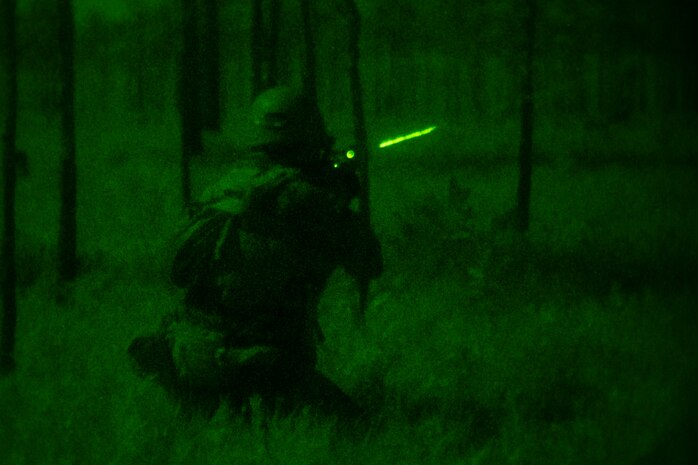 A U.S. Marine with Echo Company, 2nd Battalion, 8th Marine Regiment, 2nd Marine Division, suppresses targets on a company battle course on range G-36, Camp Lejeune, N.C., May 23, 2021. Echo Company was the first company to execute the battle course as a night live-fire event. The event is the culmination of their Marine Corps Combat Readiness Evaluation, certifying the unit as an apex battalion.