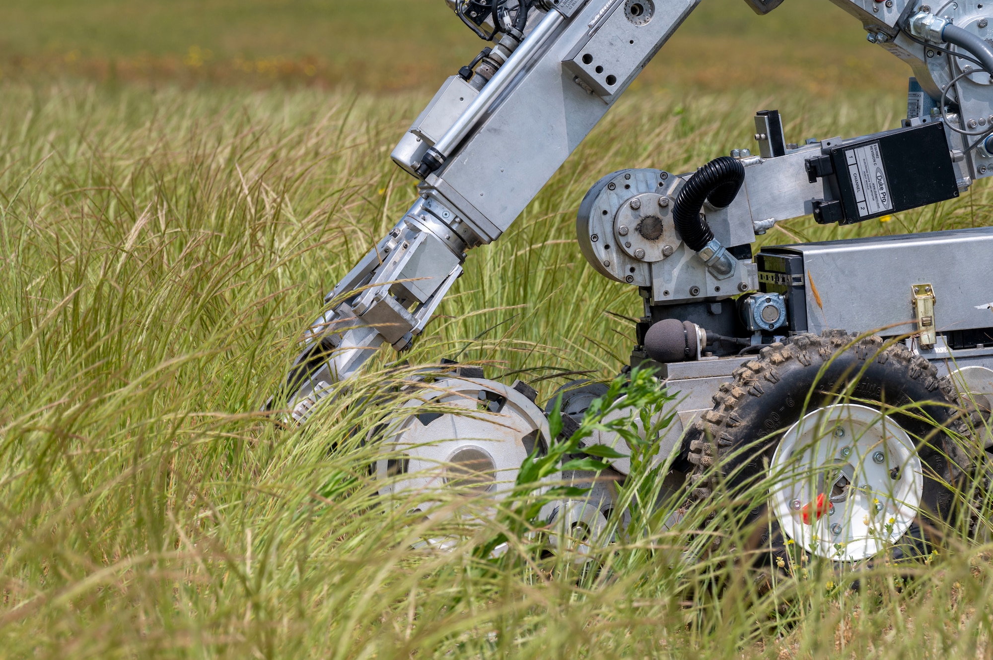 An F6A explosive ordnance disposal robot locates a simulated explosive during an exercise at Dover Air Force Base, Delaware, May 26, 2021. The exercise tested EOD personnel on the detection and diffusion of simulated improvised explosive devices. (U.S. Air Force photo by Airman 1st Class Cydney Lee)