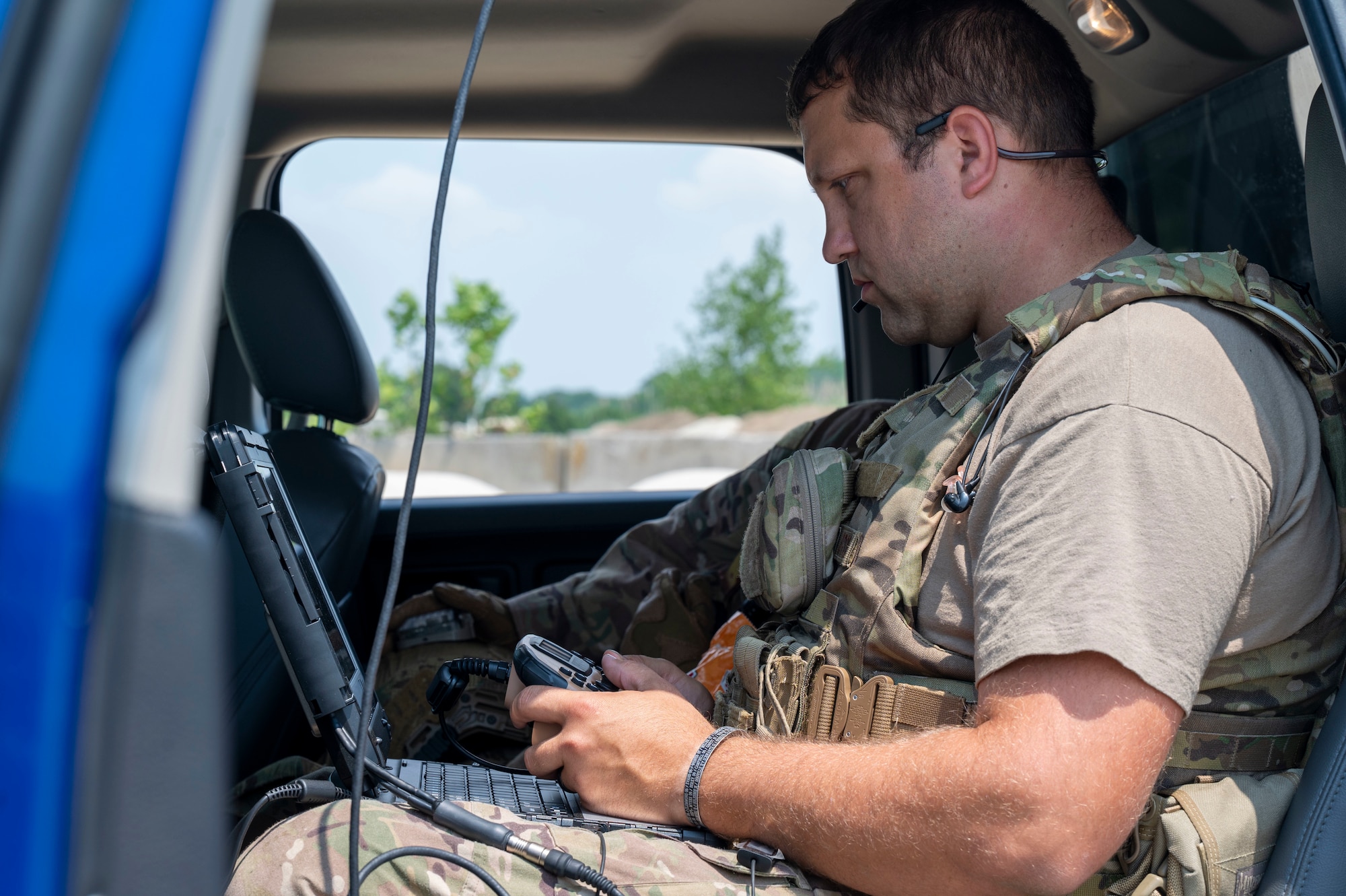 Staff Sgt. Jordan Caldwell, 436th Civil Engineer Squadron explosive ordnance disposal journeyman, uses an operator control panel to direct a Man Transportable Robotic System during an exercise at Dover Air Force Base, Delaware, May 26, 2021. The exercise tested EOD personnel on the detection and diffusion of simulated improvised explosive devices. (U.S. Air Force photo by Airman 1st Class Cydney Lee)