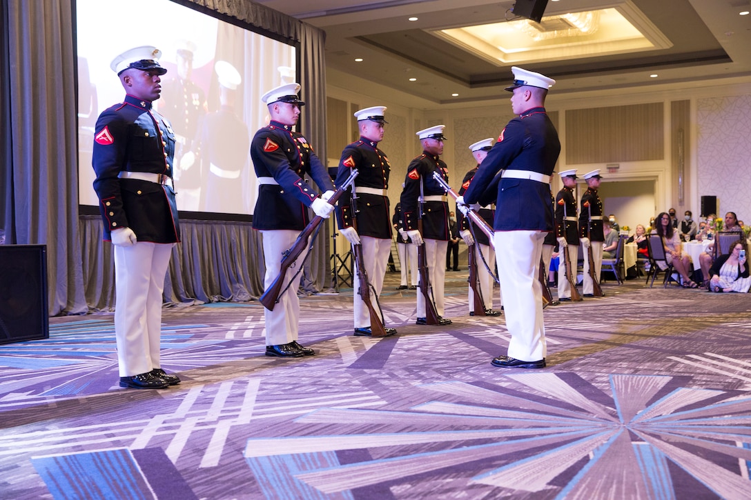 Marines with the Silent Drill Platoon conduct their rifle inspection sequence during “Long Line'' at the Tragedy Assistance Program for Survivors Grand Banquet in Washington D.C., May 29, 2021. TAPS provides comfort, care and resources to all those grieving the death of a military loved one. (U.S. Marine Corps photo by Lance Cpl. Mark A. Morales)