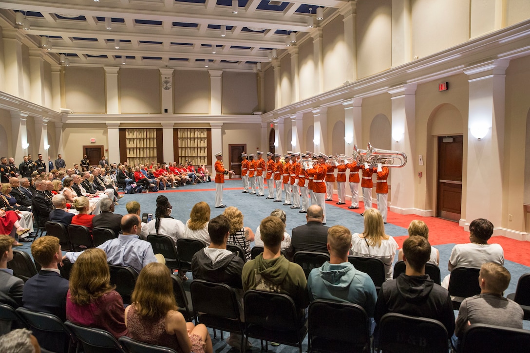 Marines with “The Commandant’s Own,” U.S. Marine Drum and Bugle Corps perform during the Indoor Ceremony at Marine Barracks Washington, D.C., May 28, 2021. The 38th Commandant of the Marine Corps Gen. David H. Berger was the hosting official, and Ms. Bonnie Carroll, the president and founder of the Tragedy Assistance Program for Survivors (TAPS) and a 2015 Presidential Medal of Freedom recipient, was our guest of honor. (U.S. Marine Corps photo by Lance Cpl. Mark Morales)
