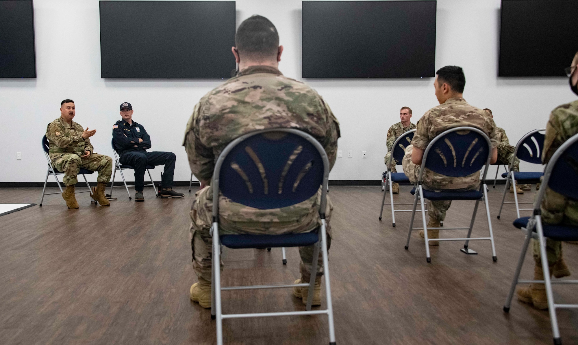 people sit in chairs