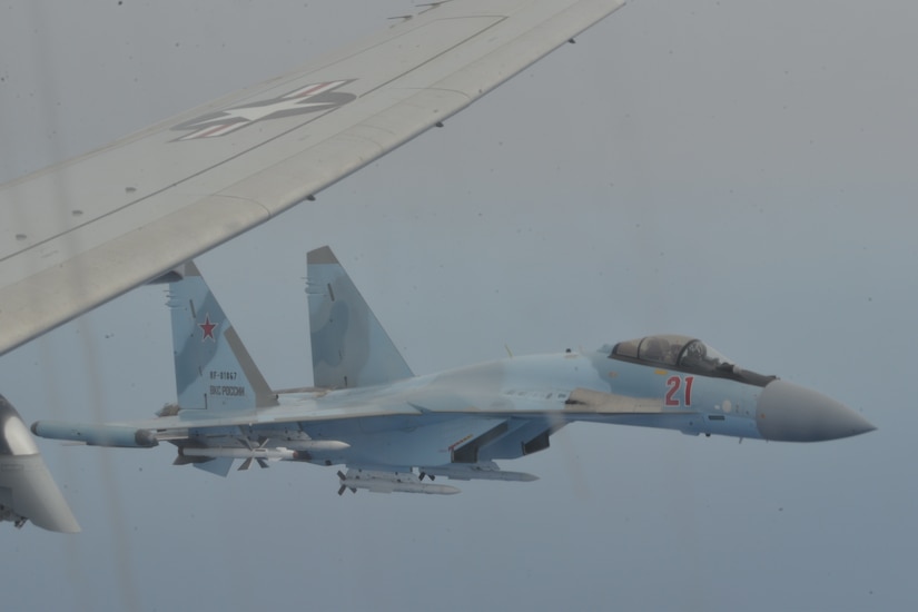 Russian fighter flies too close to U.S. aircraft over the Mediterranean.