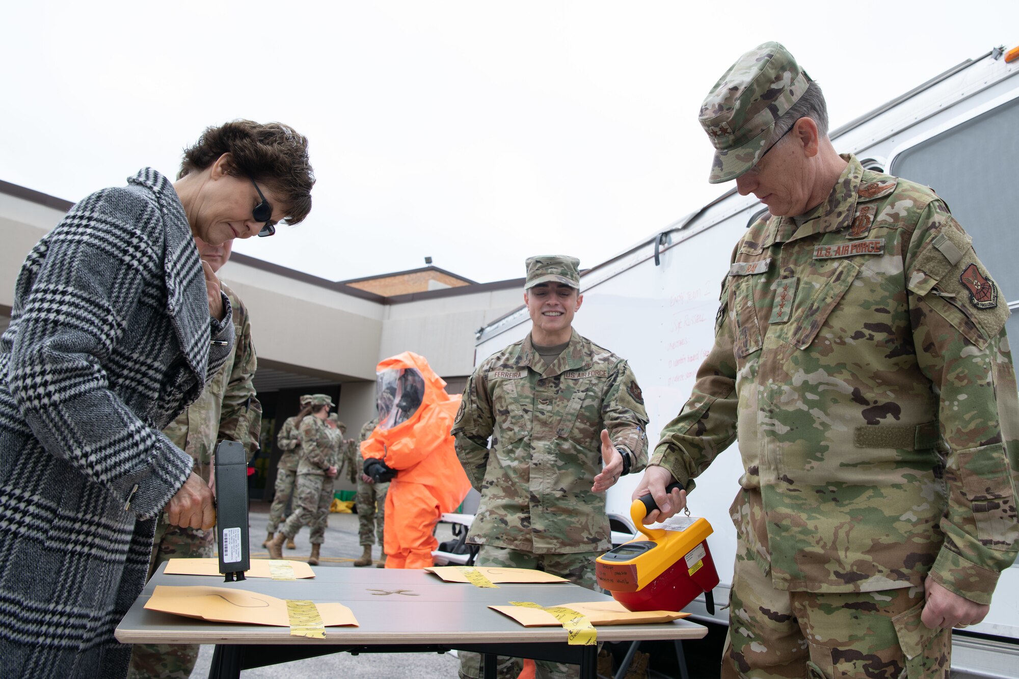 Rhonda Ray and her husband, Gen. Tim Ray, Air Force Global Strike Command commander, use a Geiger counter during a radioactive material identification demonstration at the 28th Medical Group on Ellsworth Air Force Base, S.D., May 26, 2021.