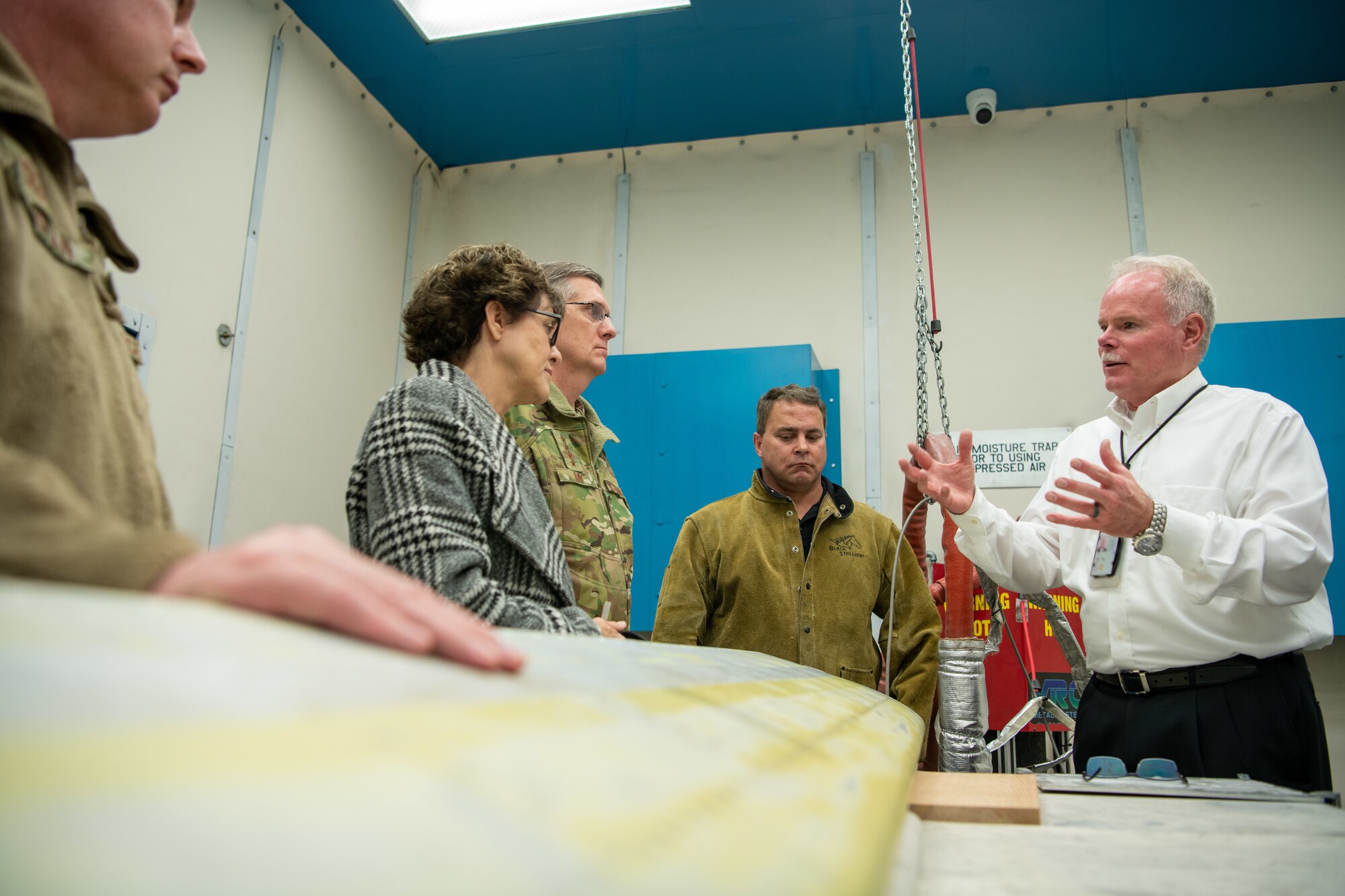 Gen. Tim Ray, the Air Force Global Strike Command commander, and his wife, Rhonda, learn about a new way to repair planes via cold spray during a tour of the 28th Maintenance Squadron Metals Technology and Additive Manufacturing Flight facility on Ellsworth Air Force Base, S.D., May 26, 2021.