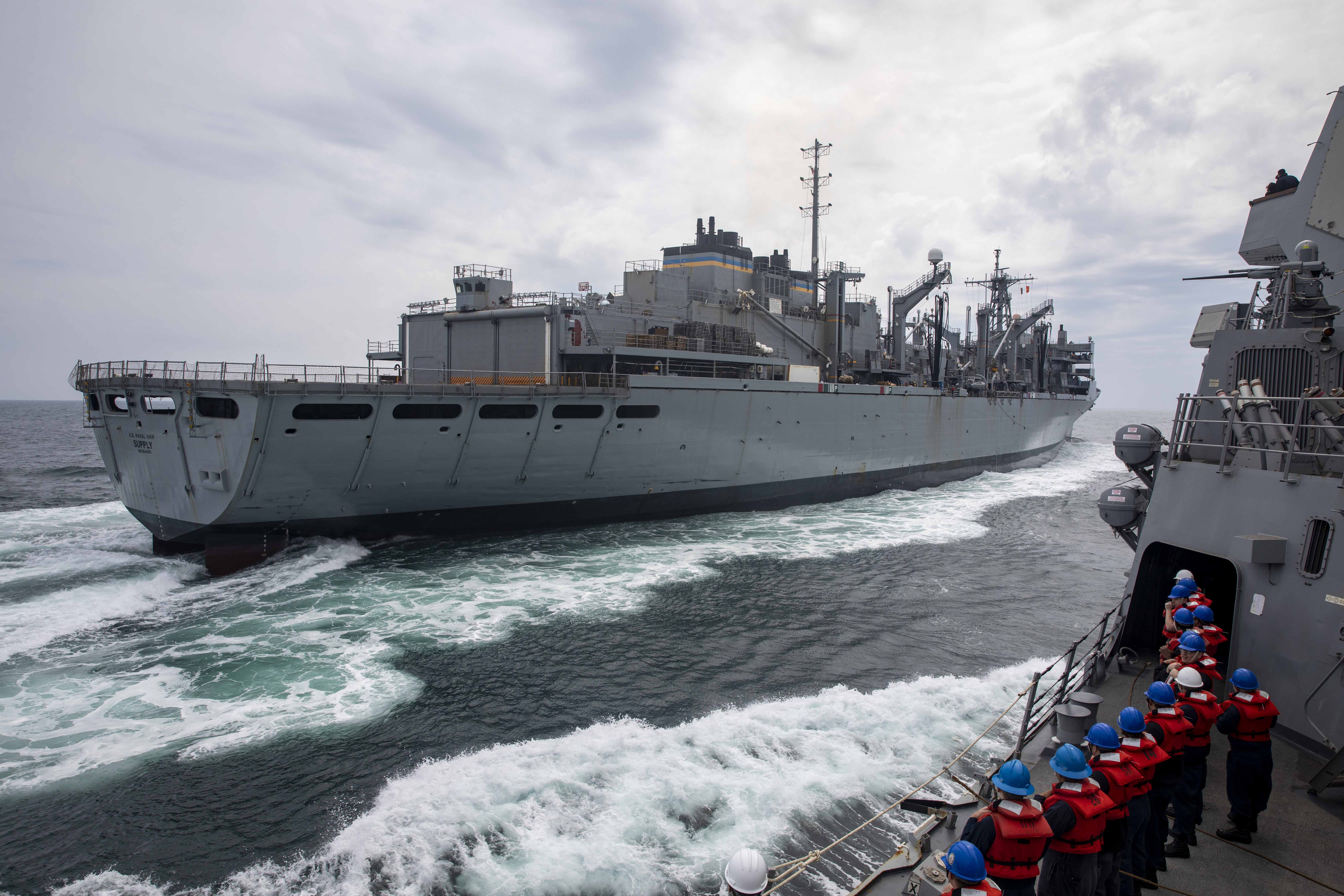 The Arleigh Burke-class guided-missile destroyer USS Paul Ignatius (DDG 117) pulls alongside the Military Sealift Command Fast Combat Support Ship USNS Supply (T-AOE 6) for a replenishment-at-sea during exercise At-Sea Demo/Formidable Shield.