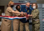 Leaders and staff from Naval Hospital Jacksonville and Naval Branch Health Clinic Kings Bay cut a ceremonial ribbon on May 27 to celebrate the new kiosk for prescription refills.