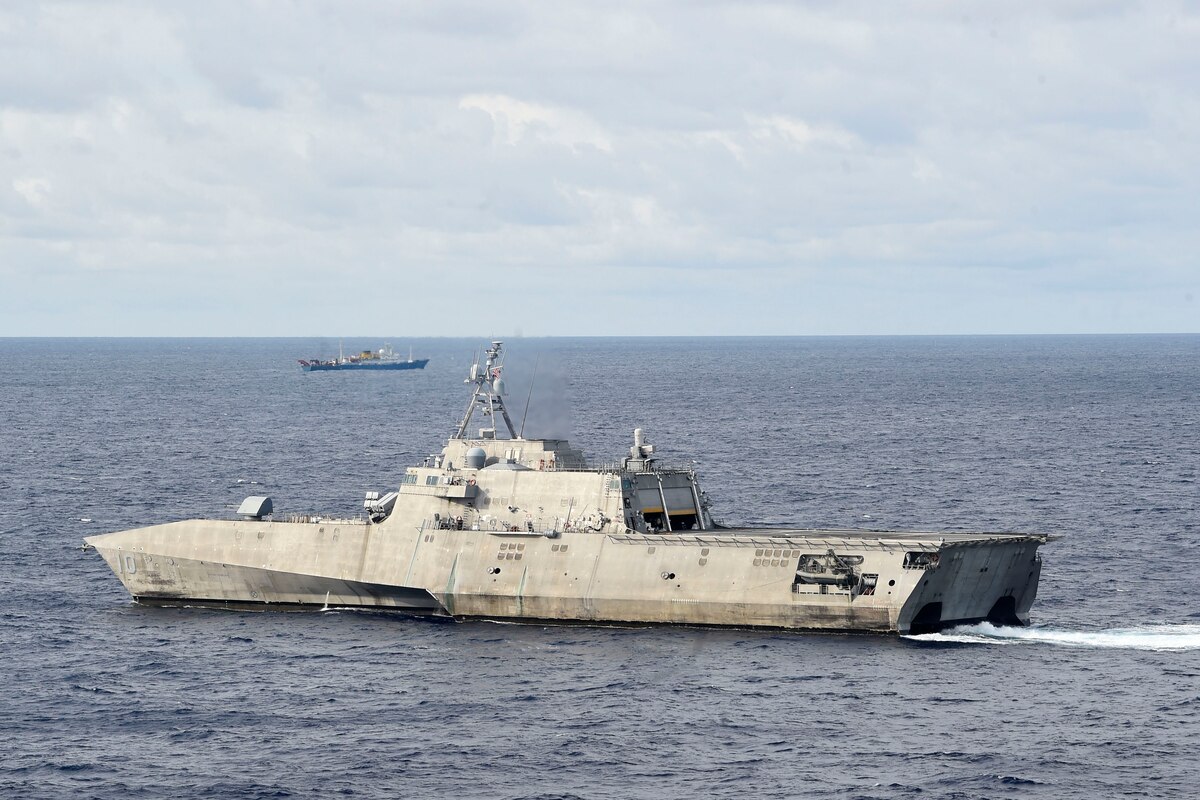 Ships maneuver in the South China Sea.