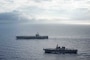 PHILIPPINE SEA (May 29, 2021) Japan Maritime Self-Defense Force Hyuga-class helicopter destroyer JS Ise (DDH 182) steams alongside the U.S. Navy’s only forward-deployed aircraft carrier USS Ronald Reagan (CVN 76). Ronald Reagan, the flagship of Carrier Strike Group 5, provides a combat-ready force that protects and defends the United States, as well as the collective maritime interests of its allies and partners in the Indo-Pacific region.