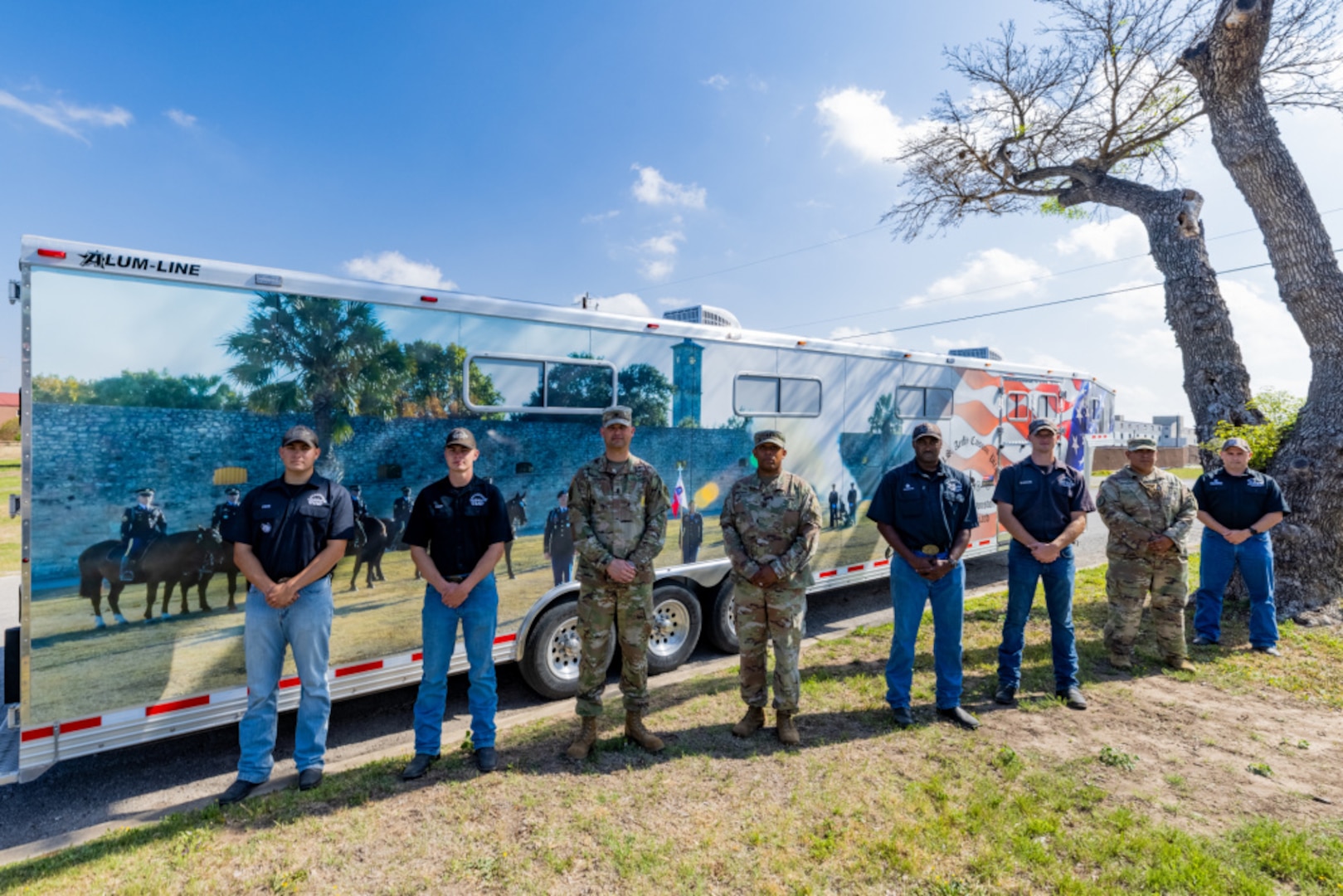 Members of the Headquarters Support Company, Headquarters and Headquarters Battalion, U.S. Army North command team, and Soldiers from the U.S. Army North Caisson Platoon, pose for a group photo after the unveiling of the Caisson Platoon’s trailer, at Joint Base San Antonio - Fort Sam Houston, April 8, 2021.