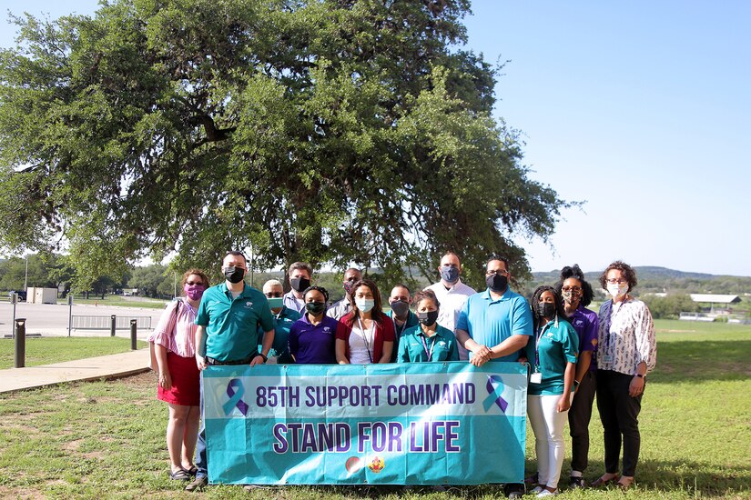 The suicide prevention training team pause for a photo during the Stand for Life training event at Camp Bullis, Texas, May 11, 2021.