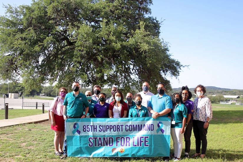 The suicide prevention training team pause for a photo during the Stand for Life training event at Camp Bullis, Texas, May 11, 2021.