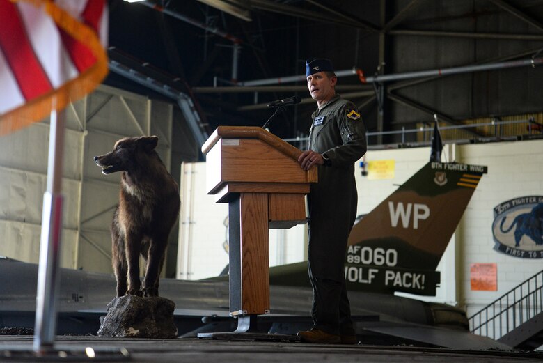 A commander speaks during a ceremony.