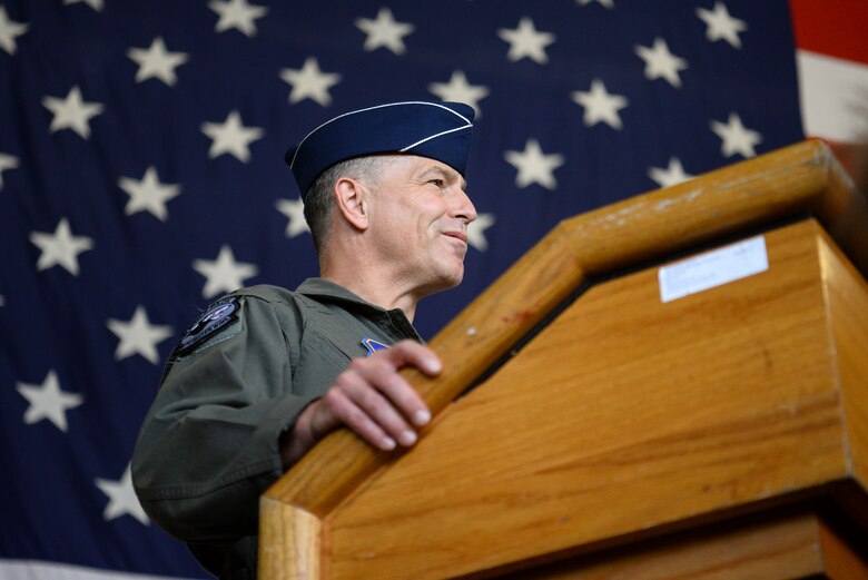 A commander speaks during a ceremony.