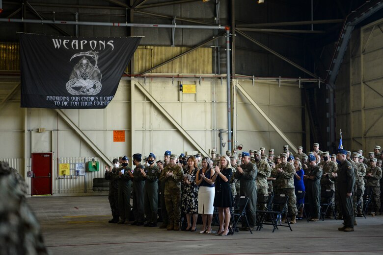 U.S. and Korean leadership applaud during a ceremony.