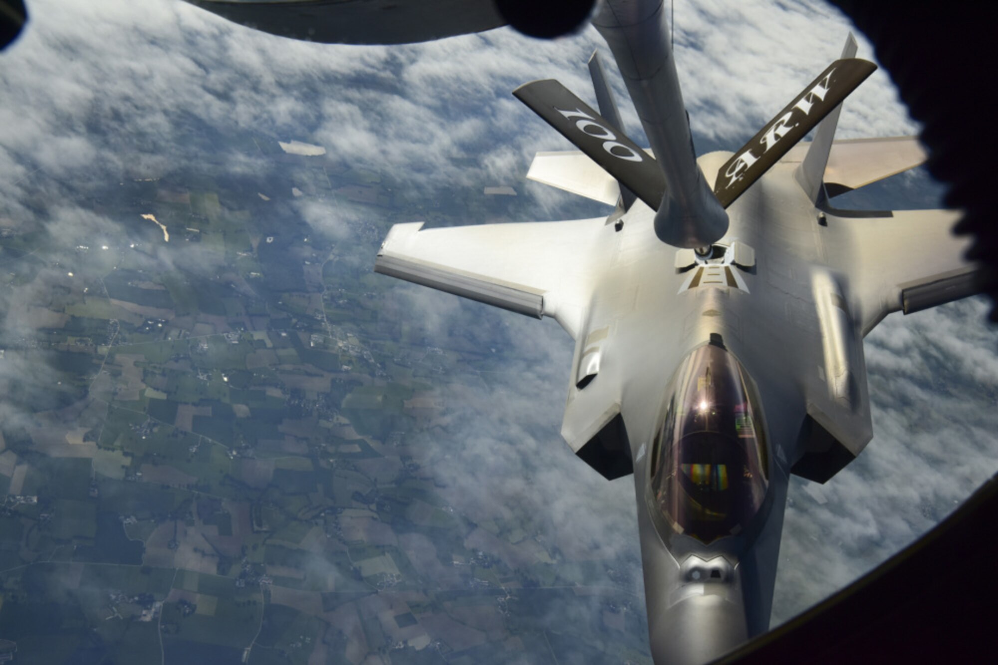 A U.S. Air Force F-35A Lightning II aircraft assigned to the 4th Fighter Squadron, Hill Air Force Base, Utah, receives fuel from a KC-135 Stratotanker aircraft assigned to the 100th Air Refueling Wing, Royal Air Force Mildenhall, England, over France, May 30, 2021. The KC-135 Stratotanker aircraft extends the range of the fifth-generation fighters enhancing the Air Force's capability to accomplish its primary mission of global reach. (U.S. Air Force photo by Master Sgt. Darnell T. Cannady)