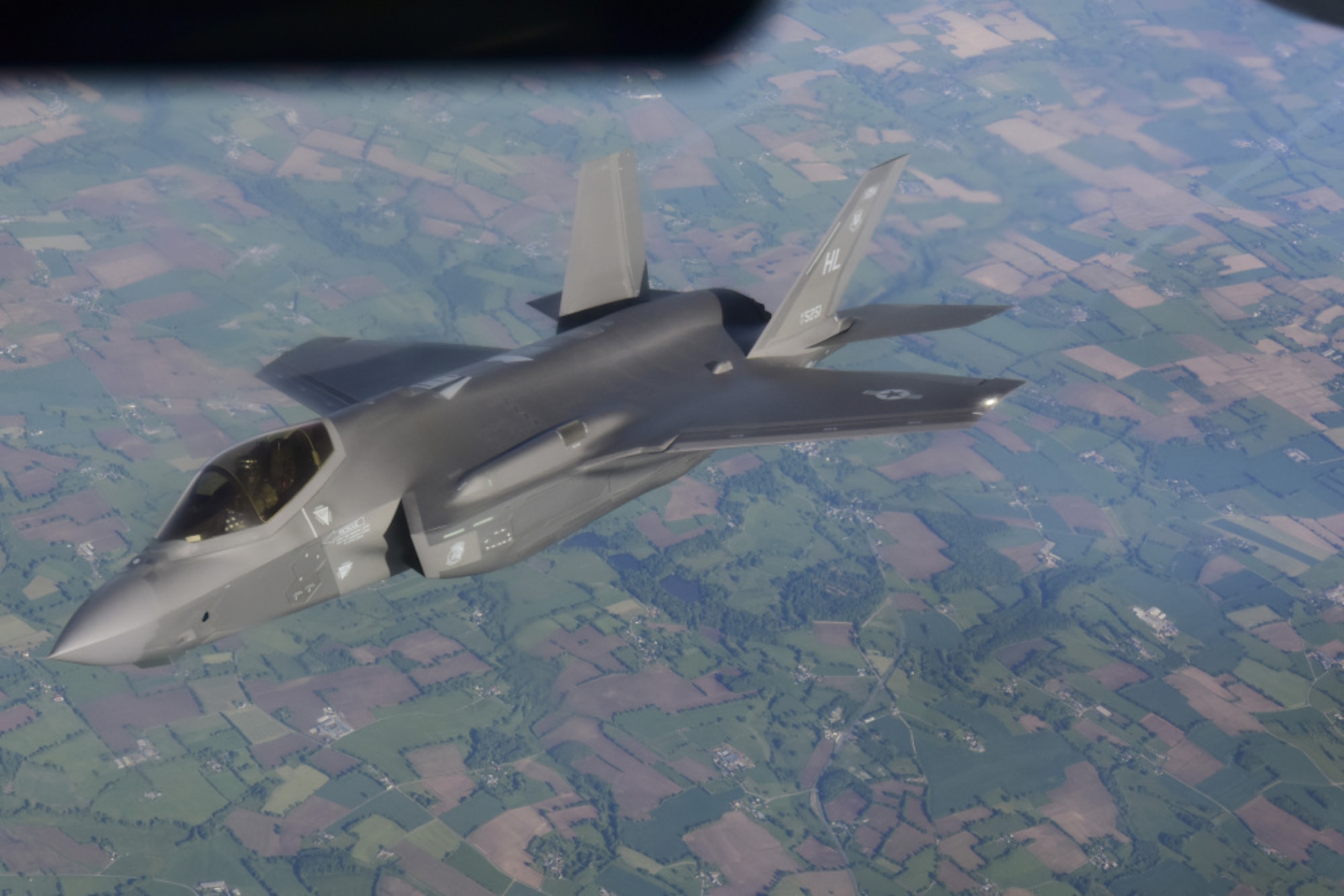 A U.S. Air Force F-35A Lightning II aircraft assigned to the 4th Fighter Squadron, Hill Air Force Base, Utah, flies over France after receiving fuel from a KC-135 Stratotanker aircraft assigned to the 100th Air Refueling Wing, Royal Air Force Mildenhall, England, May 30, 2021. The F-35A provides next-generation stealth, enhanced situational awareness, and reduced vulnerability for the United States and allied nations. (U.S. Air Force photo by Master Sgt. Darnell T. Cannady)