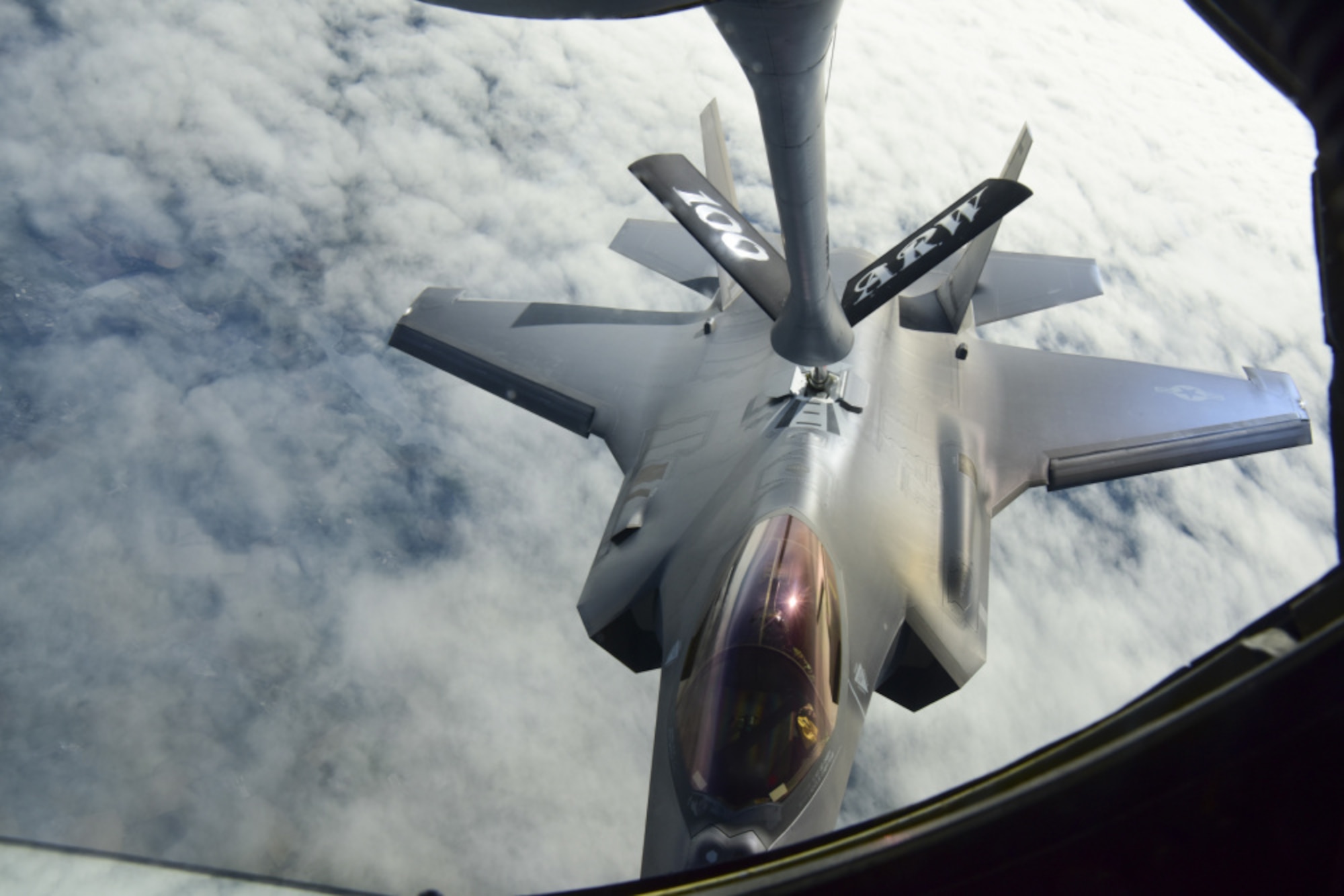 A U.S. Air Force F-35A Lightning II aircraft assigned to the 4th Fighter Squadron, Hill Air Force Base, Utah, receives fuel from a KC-135 Stratotanker aircraft assigned to the 100th Air Refueling Wing, Royal Air Force Mildenhall, England, over France, May 30, 2021. The KC-135 Stratotanker aircraft extends the range of the fifth-generation fighters enhancing the Air Force's capability to accomplish its primary mission of global reach. (U.S. Air Force photo by Master Sgt. Darnell T. Cannady)