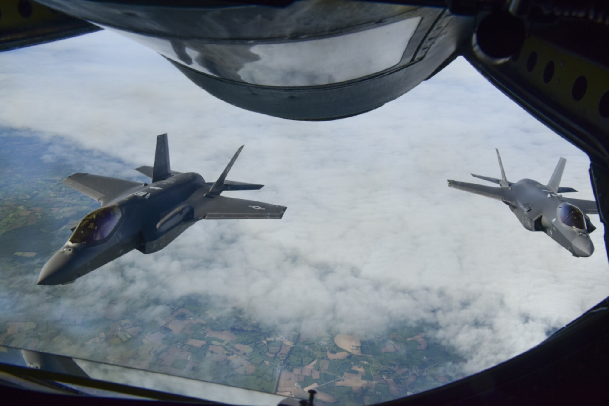 Two U.S. Air Force F-35A Lightning II aircraft assigned to the 4th Fighter Squadron, Hill Air Force Base, Utah, fly over France, May 30, 2021. The F-35A provides next-generation stealth, enhanced situational awareness, and reduced vulnerability for the United States and allied nations. (U.S. Air Force photo by Master Sgt. Darnell T. Cannady)