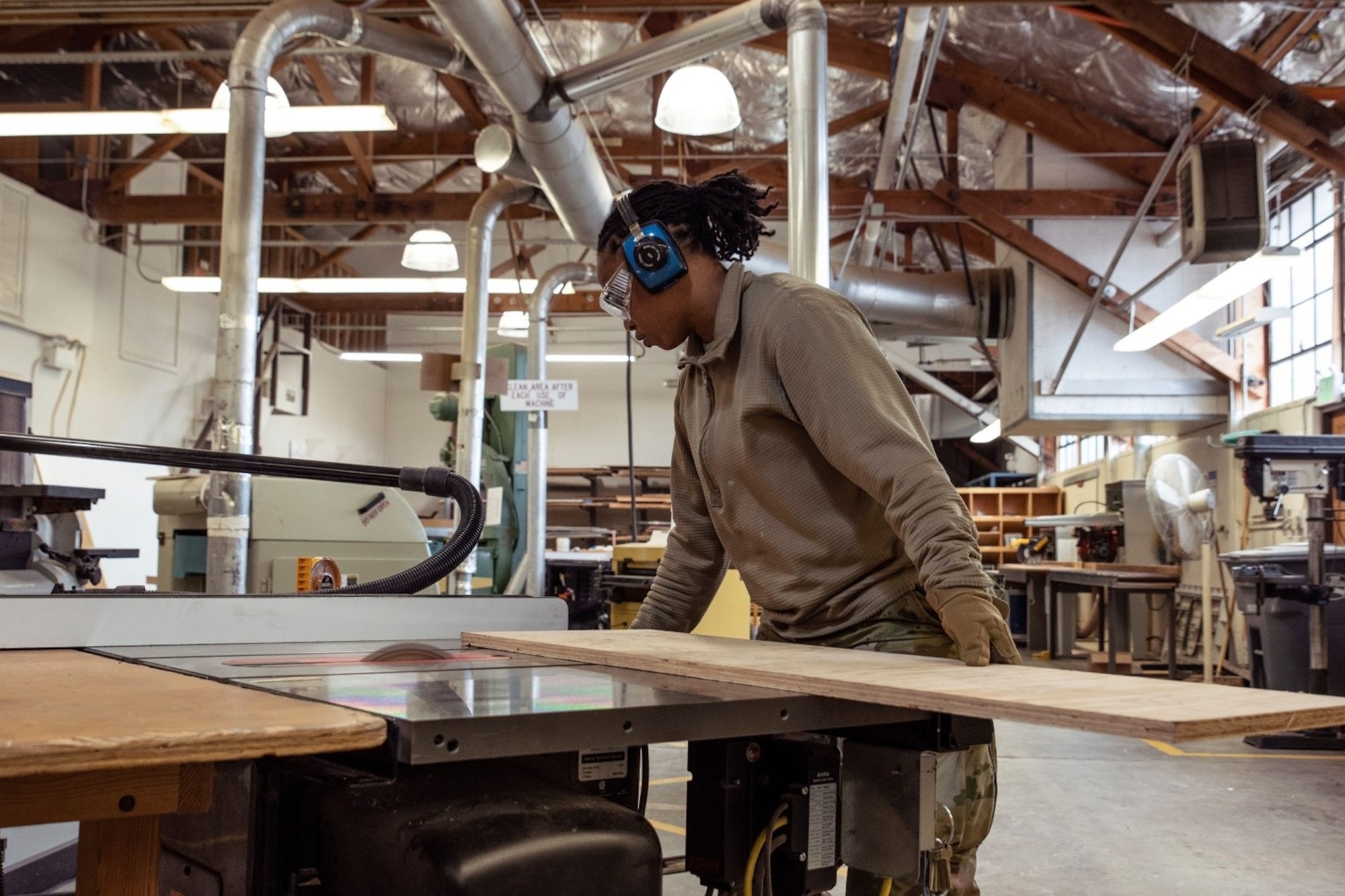 U.S. Air Force Staff Sgt. Jerika-Deandra Thomas, 627th Civil Engineer Squadron structural journeyman, cuts piece of plywood May 20, 2021, at Joint Base Lewis-McChord, Washington. Since joining the ranks of the Air Force five years ago, Thomas has demonstrated her deep understanding of the Air Force core values by receiving the John Levitow Award, rescuing individuals involved in a dangerous car crash, working toward a degree in criminal justice, and becoming a mentor for high school students. (U.S. Air Force photo by Senior Airman Zoe Thacker)