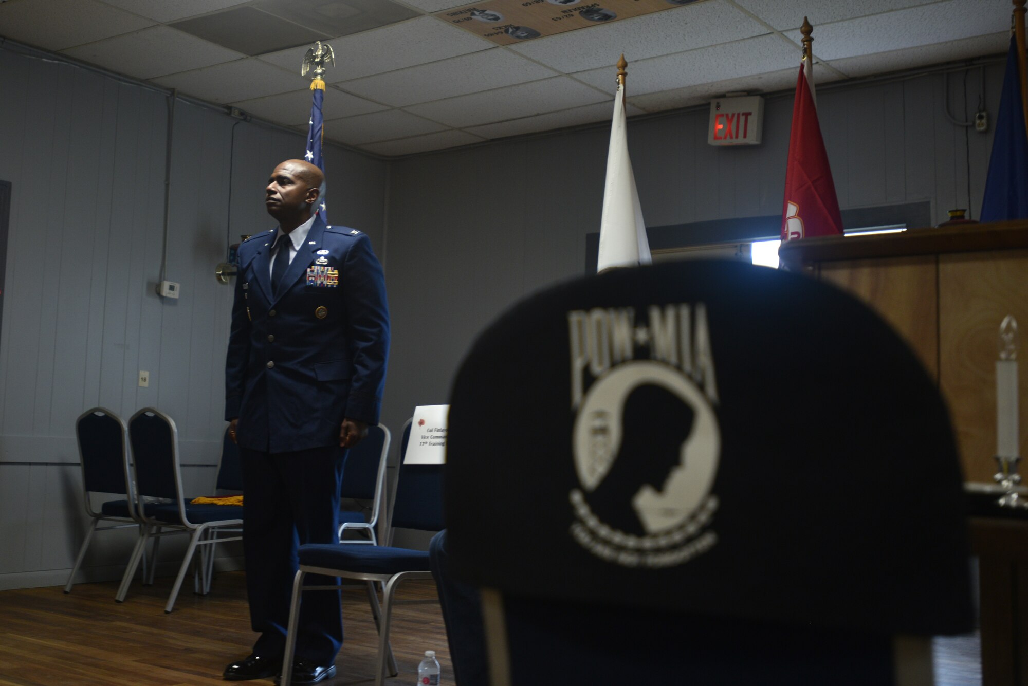 U.S. Air Force Col. James Finlayson, 17th Training Wing vice commander, stands at attention during the singing of the Armed Forces Medley at the Memorial Day ceremony at the Veterans of Foreign Wars Post 1815 in San Angelo, Texas, May 31, 2021. Finlayson was a guest speaker for the ceremony and spoke on the importance of honoring those who died serving the country. (U.S. Air Force by Senior Airman Ashley Thrash)