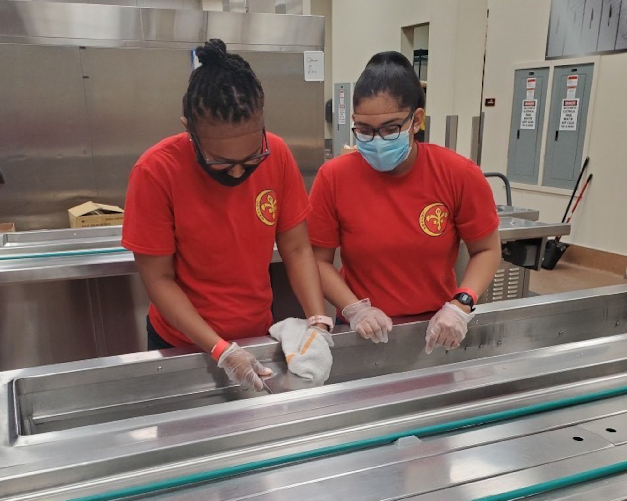 Tech. Sgt. Cassandra Smith and Airman First Class Jasmin Valdez-Ramos, 706th Fighter Squadron, volunteer at a local nonprofit food organization May 27, in Las Vegas, Nevada.