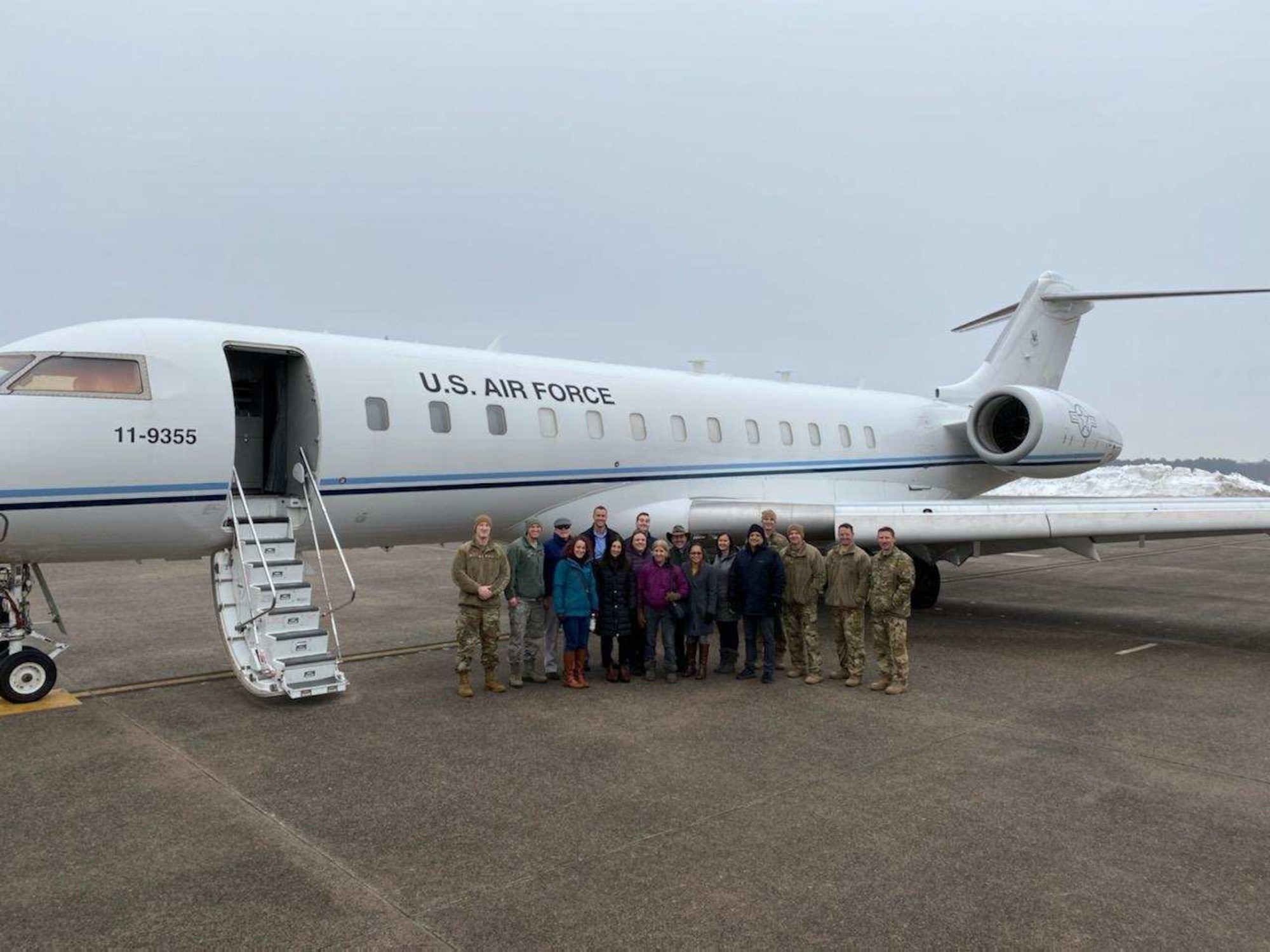 Members of the Battlefield Airborne Communications Node program office, headquartered here, pose next to a Bombardier Global 6000 at Bradley International Airport in Windsor Locks, Conn., in Nov. 2019. On June 1, the team awarded a $464.8 million contract to Learjet, Inc., a the U.S. subsidiary of Bombardier Inc. The five-year indefinitely quantity, indefinitely delivery contract provides funds for purchasing up to six Bombardier Global 6000 aircraft (Courtesy photo)