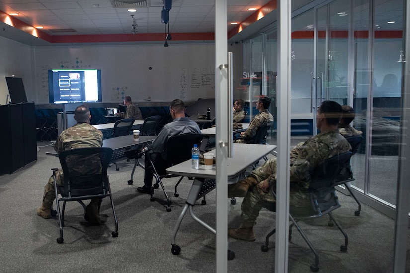 Photos of Innovation Round Table attendees participating in a Zoom call.