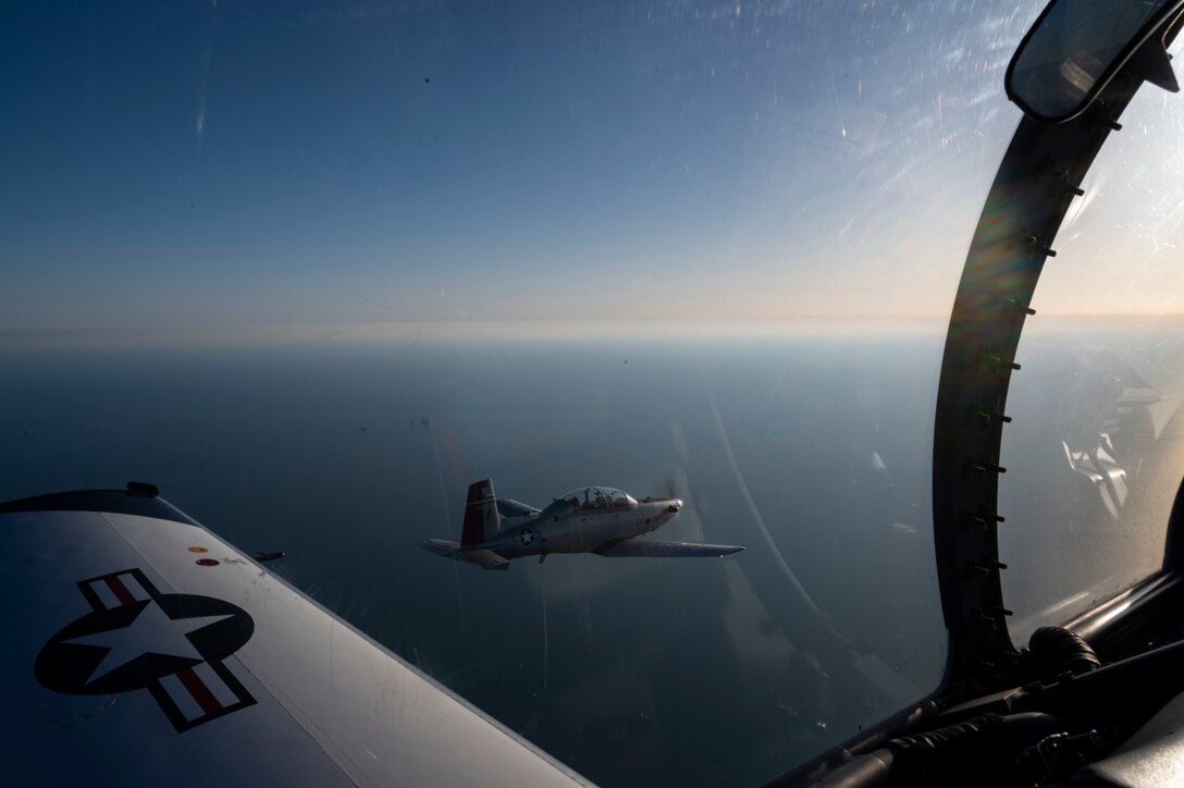 The 434th Flying Training Squadron flagship flies cross-country from Laughlin Air Force Base, Texas, Mar. 20. 2021. The 434th FTS flagship is a symbol of the squadron spirit, and this flagship was painted to commemorate the P-51 Mustang from World War II, flown by Robin Olds.(U.S. Air Force photo by Airman 1st Class David Phaff)