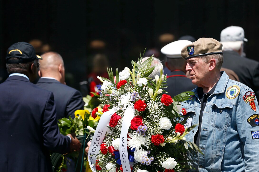 U.S. Marine Corps Sgt. Maj. Troy E. Black, the 19th sergeant major of the Marine Corps, attends the Memorial Day name addition ceremony at the Vietnam Veterans Memorial in Washington, D.C., May 31, 2021. The ceremony was held to honor the families and their service members who died in the Vietnam War. Memorial Day serves as a remembrance for all veterans who fought and died in service to the Nation. (U.S. Marine Corps photo by Sgt. Victoria Ross)
