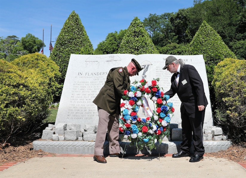 U.S. Army Reserve Col. Andrew T. Love, G4 for the U.S. Army Civil Affairs and Psychological Operations Command (Airborne), places a wreath representing those who served and were lost during World War I while participating in the 2021 Fayetteville, N.C., Memorial Day Ceremony to honor America’s fallen military service members, May 31, 2021, at Freedom Memorial Park.