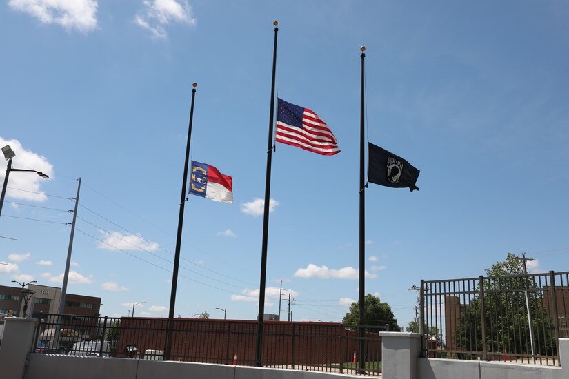 Flags fly at half staff during the 2021 Fayetteville, N.C., Memorial Day Ceremony to honor America’s fallen military service members, May 31, 2021, at Freedom Memorial Park.