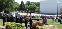 Soldiers from the 27th Engineer Battalion (Combat)(Airborne), 20th Engineer Brigade, present arms after performing a 21-gun salute during the 2021 Fayetteville, N.C., Memorial Day Ceremony to honor America’s fallen military service members, May 31, 2021, at Freedom Memorial Park.
