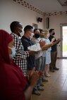 U.S. Soldiers with Civil Affairs East Africa (CA-EA), a forward deployed element of Southern European Task Force - Africa (SETAF-AF) and Combined Joint Task Force – Horn of Africa (CJTF-HOA), present English discussion group certificates to students at the Sunny Hill Hospitality School, Arta, May 20, 2021. More than 60 members from the community participated in the group discussions, improving their English speaking and comprehension skills by interacting with native speakers.