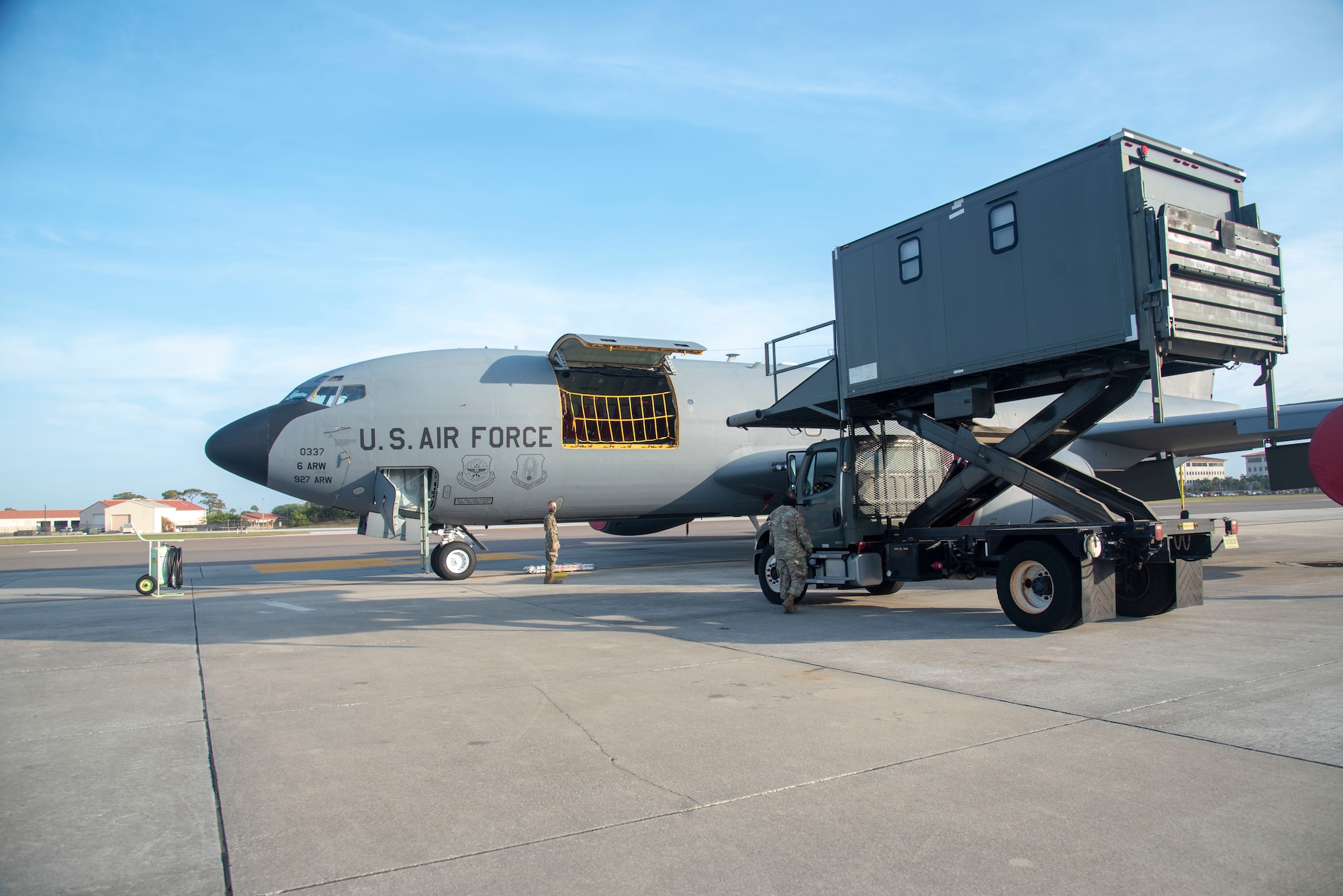 A 6th Operations Support Squadron (OSS) Aircrew Flight Equipment (AFE) truck pulls up to a KC-135 Stratotanker on the flightline at MacDill Air Force Base, Florida, April 14, 2021. AFE keeps all the lifesaving equipment and survival components on aircraft up to date by performing regular inspections, maintenance and replacing outdated equipment.