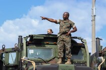 U.S Marine Corps Gunnery Sgt. Luckner Desma, chief, Motor Transport Operations goes over immediate action drills during a Vehicle Commander Course on Camp Hansen, Okinawa, Japan, April 20, 2021.