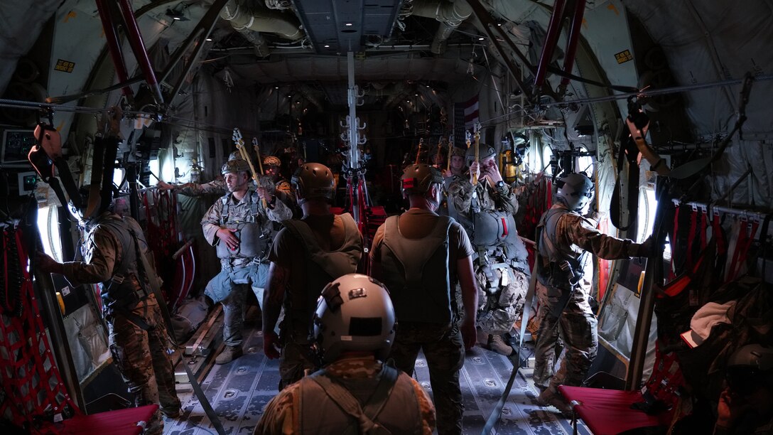 Joint Readiness Training Center, Operation Group Airborne parachutists standby for their static line jump from a C-130J Super Hercules. The 815th  provided airlift and airdrop support during Voyager Shield, an exercise hosted by the 621st Air Mobility Advisory Group at the Joint Readiness Training Center and Fort Polk, La., May 25-27. This exercise provided the 815th AS required tactical training for the pilots and loadmasters. Pilots trained on communicating with landing and drop zone controllers, semi-prepared runway operations, and assault landings. Loadmaster specific training included rolling stock loading/unloading in both normal and engine running operations, patient loading with engines running and personnel drops. (U.S. Air Force photo by Jessica L. Kendziorek)