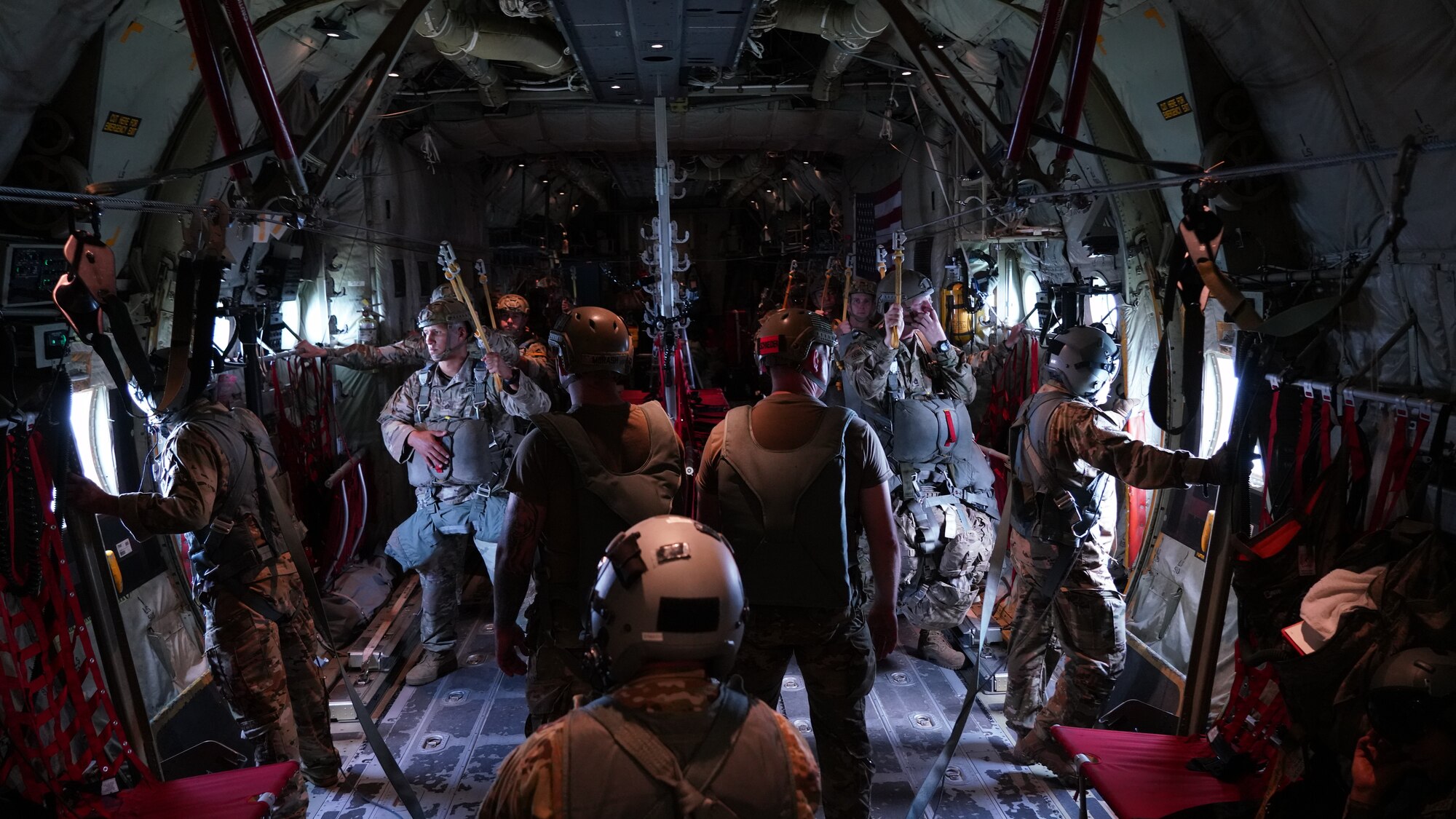 Joint Readiness Training Center, Operation Group Airborne parachutists standby for their static line jump from a C-130J Super Hercules. The 815th  provided airlift and airdrop support during Voyager Shield, an exercise hosted by the 621st Air Mobility Advisory Group at the Joint Readiness Training Center and Fort Polk, La., May 25-27. This exercise provided the 815th AS required tactical training for the pilots and loadmasters. Pilots trained on communicating with landing and drop zone controllers, semi-prepared runway operations, and assault landings. Loadmaster specific training included rolling stock loading/unloading in both normal and engine running operations, patient loading with engines running and personnel drops. (U.S. Air Force photo by Jessica L. Kendziorek)